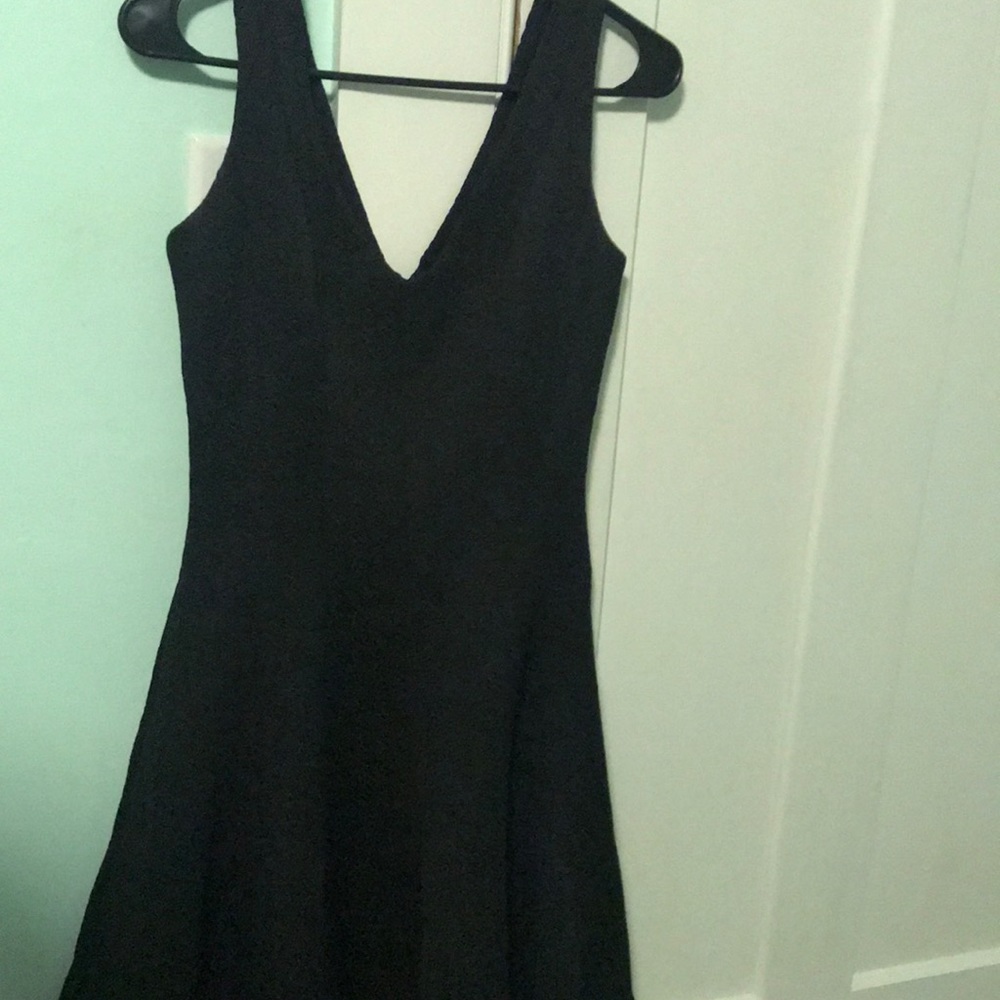 Never worn, textured, black a-line dress